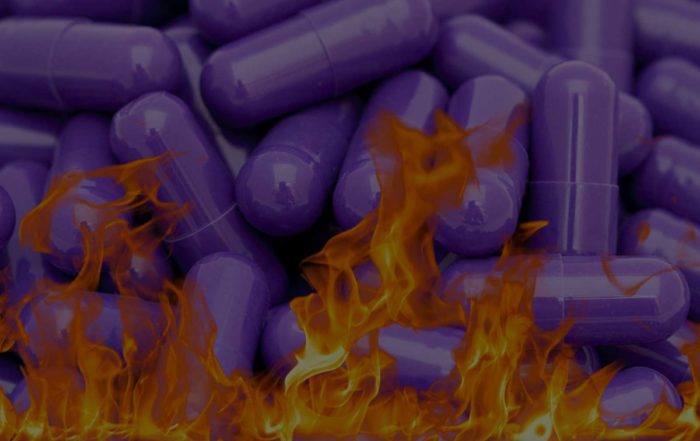purple pills in flames