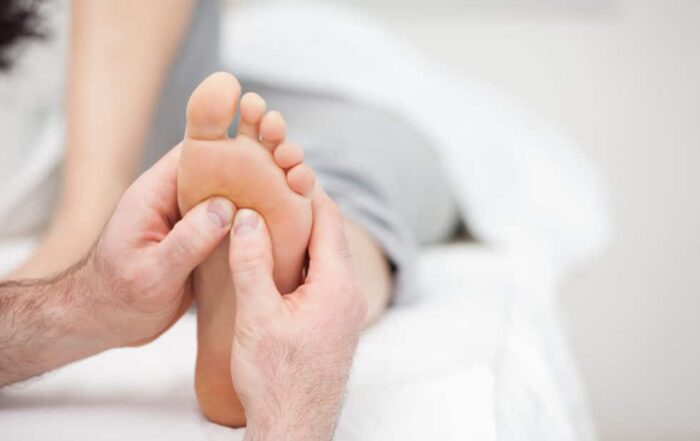 Healthcare professional discussing advanced neuropathy treatment options for healthier nerve function