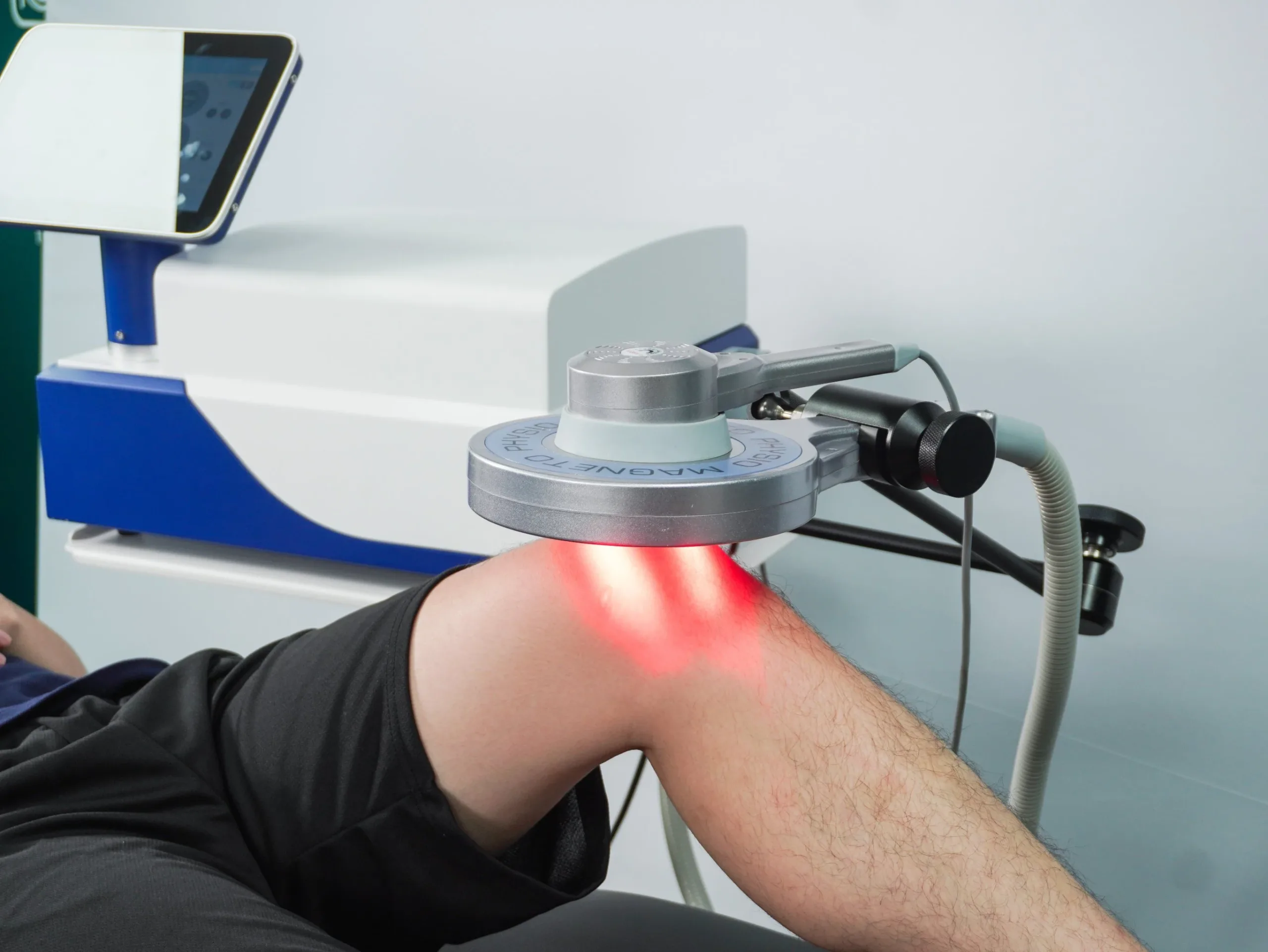 Patient receiving EMTT therapy treatment to help reduce joint pain and improve mobility