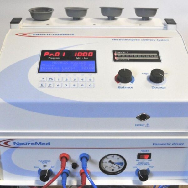 Medical NeuroMed device with digital display, control knobs for balance and dosage, pressure gauge, and colored cable connections.