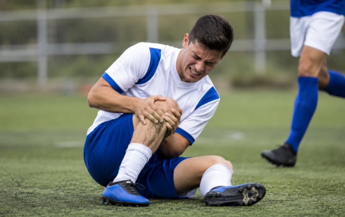 Injured player on the soccer field