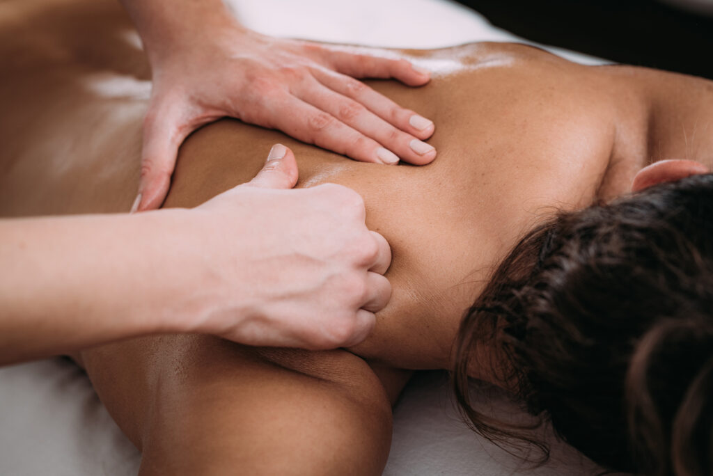 Massage therapy session supporting muscle recovery and relaxation